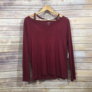 ALYA brand long sleeve top, cage neckline.